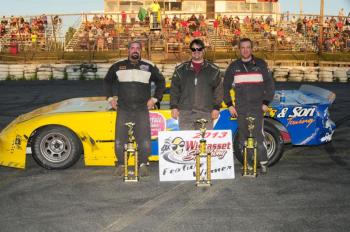 The top-three finishers before post-race inspection included, from left, Josh Bailey, Adam Chadbourne and Bobby Mesimer. Chadbourne was disqualified when he failed the post-race inspection. Mesimer was awarded first, Bailey second and Dan Nesmith moved to third. Courtesy of Peter Taylor, Wiscasset Speedway