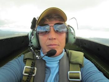 Maine Aeronautics Association President Lisa Reece gets a ride in a Texas Flying Legends Museum Warbird, a P-51. Photo courtesy MAA