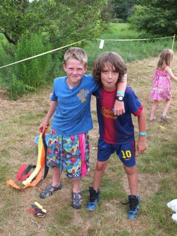 Liam Dun and James Dun Rappaport take a break from the ribbon toss at Volksmarch. RYAN LEIGHTON/Boothbay Register