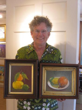 John M.T. Seitzer displays some of his new work, now on exhibit at The First bank.