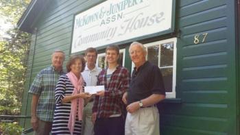 Presenting the donation to the BRSAF in front of the JPVIS Community Center are, from left: Peter Edwards, President of JPVIS; Anne Dooley, Manley Reed Fund centennial representative for JPVIS; Andy Matthews, BRSAF Board Member and JPVIS member; Cade Smith, Recipient of the Manley Reed Scholarship Grant for 2013; and Ham Meserve, President, BRSAF. Courtesy of Peter Edwards