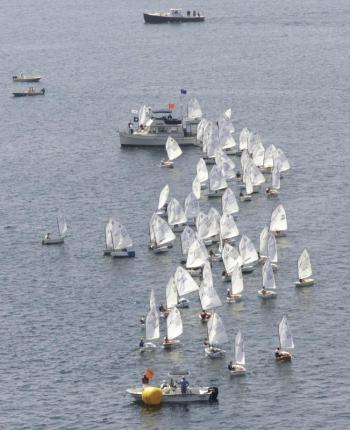 The Opti racers line up to start a race. Pilot Mark Keegan provided Nick Mace with this opportunity to photograph the races from sky. 