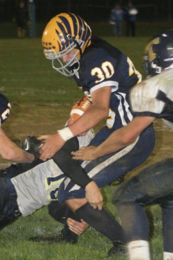 Seahawk fullback Gabe Purin busts through the Traip defense for some rushing yardage during Friday night’s game at Sherman Field. KEVIN BURNHAM/Boothbay Register