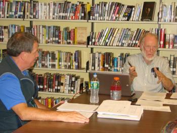 John Merry, left, who heads transportation and maintenance for Sheepscot Valley Regional School Unit, listens to fellow facilities committee member Richard DeVries of Westport Island September 19. SUSAN JOHNS/Wiscasset Newspaper