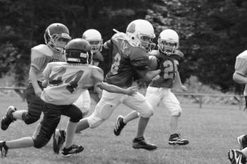 Camden Miller runs the ball against Medomak. Courtesy of Molly Barter