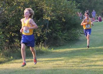 The heat and humidity put a damper on individual running times but did not affect BRHS cross country teams’ overall performance. Both boys and girls teams took first place at the September 11 meet at Winthrop. Pictured here, Joey Paolillo, who finished second for the Seahawks and third overall, and Robert Campbell, who finished fourth overall. With their five scorers in the top ten finishers, the boys lodged an easy victory in tough conditions. SARAH MORLEY/Boothbay Register