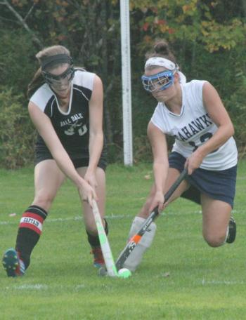 Senior co-captain Tori Schmid battles a Hall-Dale player for the ball during Friday’s game at Perkins Field. KEVIN BURNHAM/Boothbay Register