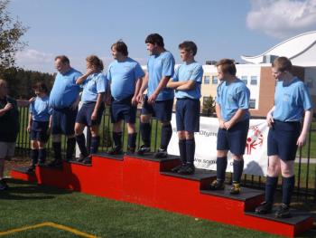 Receiving their silver medals at the Central Maine soccer tournament are, from left, Ronda LeConte, Donny Dunning, Brenda LeConte, Matt Farnham, Joey Ranco, Thomas Wilcox, Danny Miller and Adam Jackimovicz. Courtesy of Toby LeConte