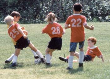 Yes, Nicole “The Lion” Lyons played organized sports. She started out as the muscle on an all-boys team, seen here, then went on to become a yearly three-season athlete before retiring at age 18. She never played football, but she played soccer and lacrosse, which she says adds up to football somehow. (She was never good at math.) Courtesy of Papa Lyons