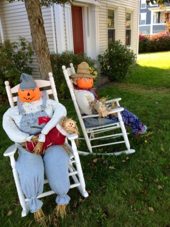 Holly Fulmer started the  parade of East Boothbay scarecrows with her display of a pair of scarecrows in rocking chairs. JOE GELARDEN/Boothbay Register