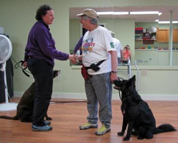 Dog trainer Jean Conte (white shirt)