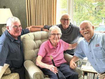 Selectmen Gerry Gamage, Mary Lou Thompson Koskela and Smith Climo present Evelyn Luther Pratt Sherman with the Boston Post Cane Sept. 18. Sarah Sherman photo 