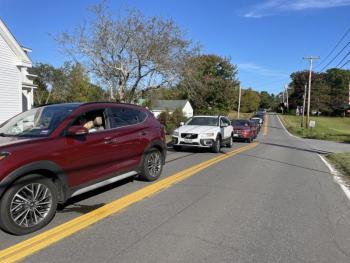 A line of cars. 