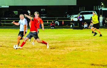 Alumni soccer game. BOB BOND/40 Federal Studio