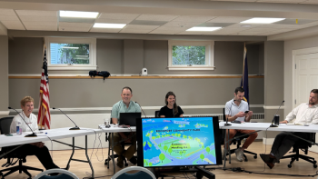 A public meeting to discuss the plan for a new RES Community Park was led by Cathy Blaha, Eamonn Hutton, M.J. Young, Dominic Pepper and Orion Thomas. (Photo by Lynda Clancy)