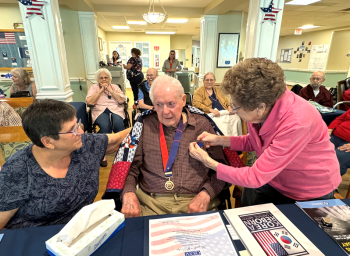 Pinning a medal