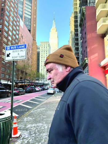 Bah umbug! Jeff braving the frigid temps in NYC, not far from where they found the robins. Courtesy of Allison Wells