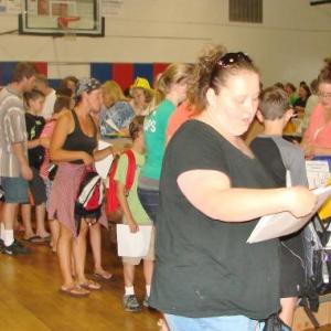 The YMCA basketball court bustled with kids and their parents selecting back to school items this past Sunday. A total of 302 students signed up and gathered the items they needed to be ready for school, according to organizer Sue Burge. HILARY RIBONS/Boothbay Register