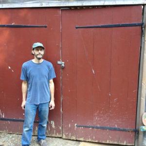 Local boat builder David Stimson stands in front of his padlocked barn on the River Road. RYAN LEIGHTON/Boothbay Register