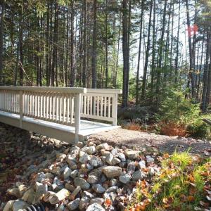 The entrance to the waterfront trail that runs along the Damariscotta River on Bigelow’s East Boothbay campus. The trails will be accessible to the public after the construction is complete. RYAN LEIGHTON/Boothbay Register