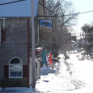 The "Open" flag still flies at Under Currach Tavern, but not for much longer. KATRINA CLARK/Boothbay Register