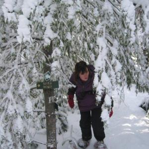 Preserve Steward Cheryl Lorrain snowshoeing on Zak Preserve.