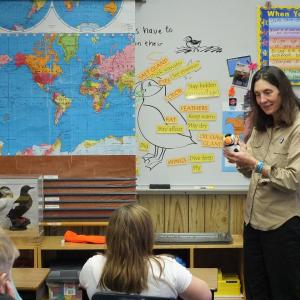 "Seabird Sue" Schubel, outreach educator for Maine Audubon's Project Puffin, visits with students at Wiscasset Primary School Wednesday, Jan. 16. She introduced the enthusiastic class to the Atlantic puffin, a seabird restored to historic nesting grounds in the Gulf of Maine. Schubel will return to the school January 31 and February 1. JOHN MAGUIRE/Wiscasset Newspaper