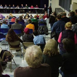 Roughly 40 citizens lined up to address the Planning Board during the final public hearing on a controversial propane terminal proposed for construction in Searsport. (Photo by Ethan Andrews)