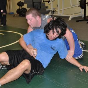 Boothbay Region High School's Antonio Maulolo, front, tries to get out of a hold during a February 11 wrestling practice at Lincoln Academy. BEN BULKELEY/Boothbay Register