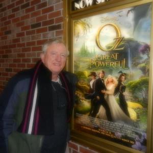 Hamilton Meserve stops outside The Harbor Theatre before viewing the film, “Oz The Great and Powerful.”