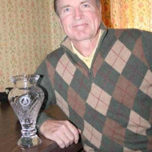 LOWELL WATSON with his 2012 Senior Player of the Year Award presented by the Maine State Golf Association. KEVIN BURNHAM/Boothbay Register