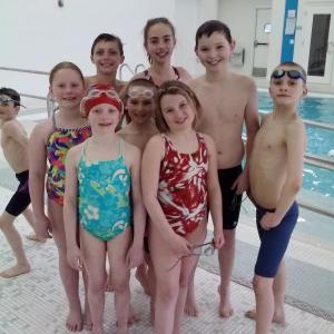 Dolphin Swimmers 9 & 10 year olds who attended the YMCA New England Championship Meet at Springfield College in Springfield, Mass., this past weekend. Pictured from left to right, back to front: Zoe Eason, Chris Hamblett, Ella Yentsch, Ben Pearce, Rowan Kristan, Callan Eason, Jaimie Labrecque, and Maren Whitney. Courtesy of YMCA