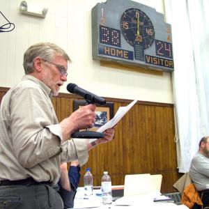 A representative of DCP Midstream, the Colorado-based company seeking to build a large propane storage and distribution terminal in Searsport, answers questions from the town's planning board Wednesday night during deliberations on project. (Photo by Ethan Andrews)