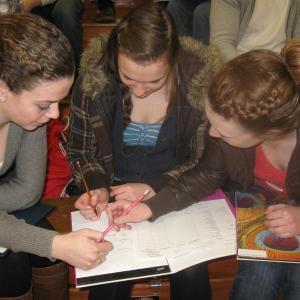 Brianna Goud, Heidi Pinkham and Megan Corson learn about real life expenses at the Financial Fitness Fair held at Wiscasset High School March 6. Courtesy of Wiscasset High School