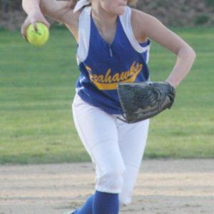 Lady Seahawk shortstop Tori Schmid gets ready to throw a runner out during the April 30 home game. KEVIN BURNHAM/Boothbay Register