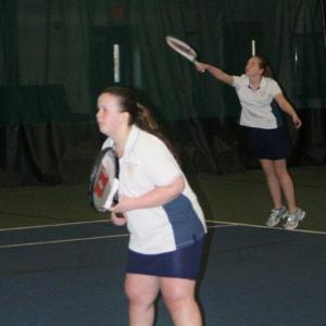 Angela Machon serves as doubles partner Dana Greenleaf watches their Wiscasset opponents. Boothbay won the match in a tiebreaker, 11-10. KEVIN BURNHAM/Boothbay Register