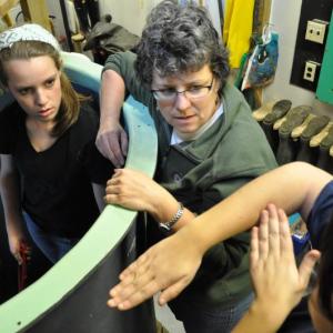 From left, Anna Sirois, Susan Amundsen and Kim Picard discuss their vision for the debris tank. BEN BULKELEY/Boothbay Register