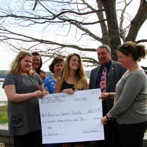 Wiscasset Middle School students and staff donate a check to the American Cancer Society on May 2. From left to right, Lily Wagg, Cindy Collamore, Carole Drury, Gabrielle Chapman, Roger Whitney and Erika Gould from the American Cancer Society Representative. SUSAN JOHNS/Wiscasset Newspaper