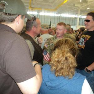 Pvt. Mason Leighton talks with his father, Micheal Leighton, and family friend, Patrick Higgins. Courtesy of Isaac Luken