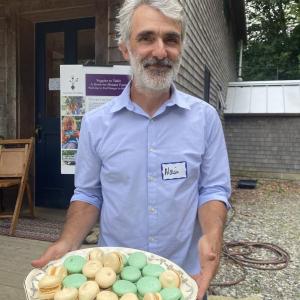 Alain Ollier with macaron. Photo Erica Berman