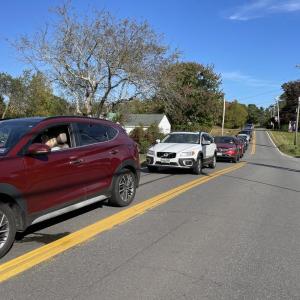 A line of cars. 