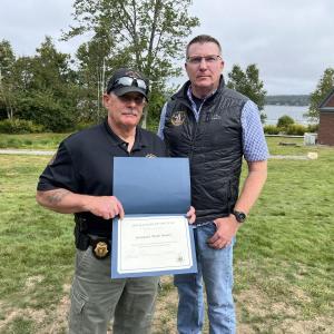 DMR Manager of the Year, Marine Patrol Sergeant Mark Murry, left, with Commissioner Patrick Keliher. Courtesy of DMR