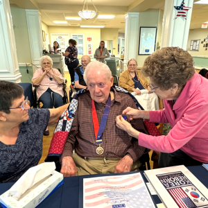 Pinning a medal