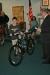 Will Perkins receives the first of 21 bikes given away on Saturday. KEVIN BURNHAM/Boothbay Register