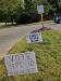 Whoever put these colorful signs here apparently didn’t notice the one already there, instructing people not to put signs there. JOE GELARDEN/Executive Editor