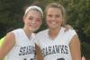 Lady Seahawk seniors Tori Schmid, left, and Brooke Alley