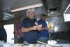 Dave McFarland and Mike Alley prepare the sausage subs. KEVIN BURNHAM/Boothbay Register