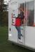 Kids learn how to escape a smoky trailer using a ladder at the open house. KEVIN BURNHAM/Boothbay Register